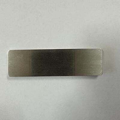 Bloco de ensaio de padrões de craqueamento de corrente de Eddy